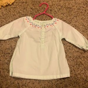 Pale blue top with floral detail. Carter’s. 3 mo.